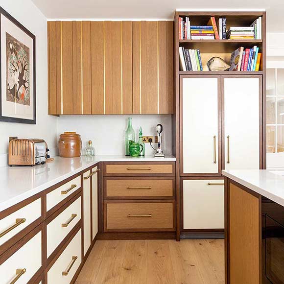 kitchen cupboards and worktops and wooden floor