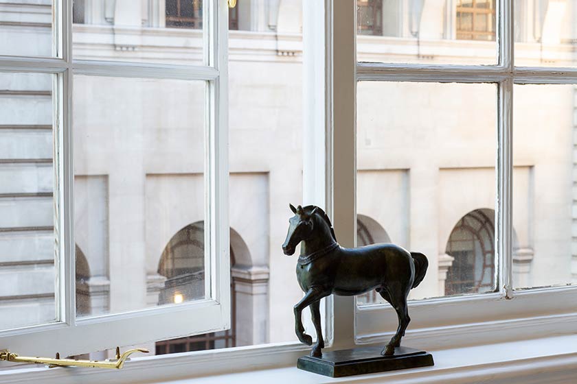 horse statue on a windowledge
