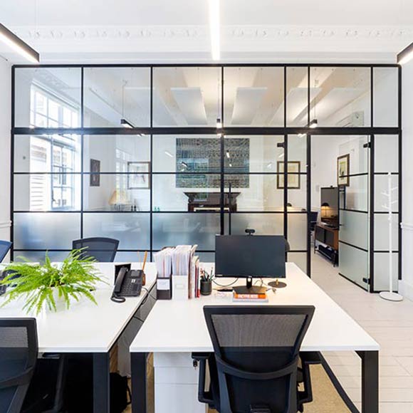 light airy offices seperated by a glass wall