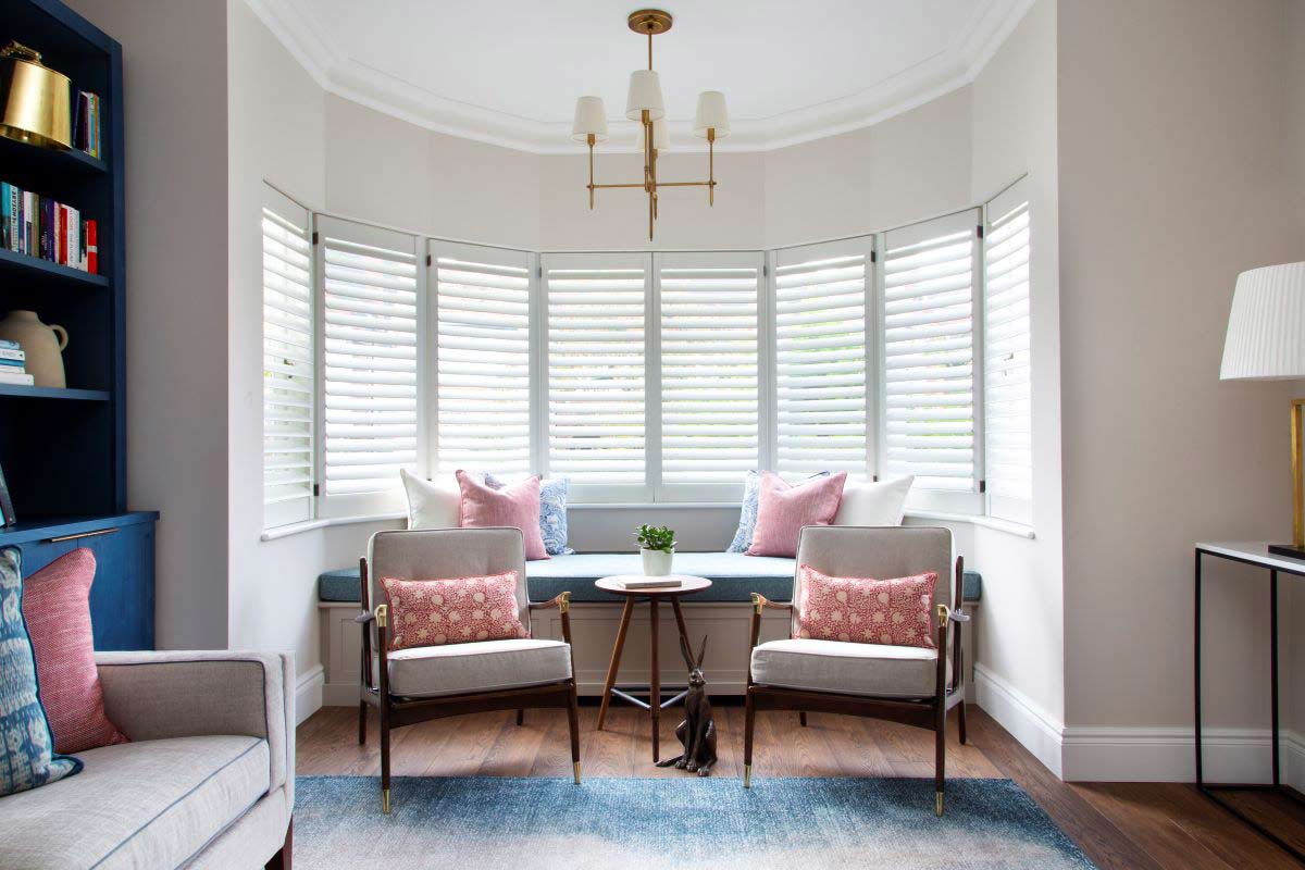 Living room with blue and pink furnishings