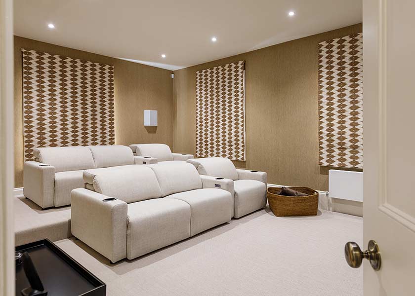 room with brown decor and sofas